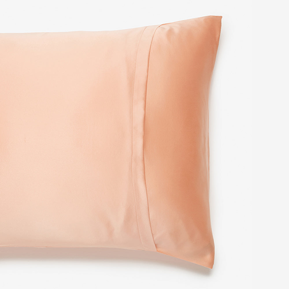 silk pillowcase in peach side view