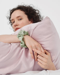 model with silk pillowcase in lavender
