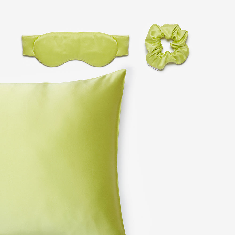 silk pillowcase, silk sleep mask and silk scrunchie in chartreuse