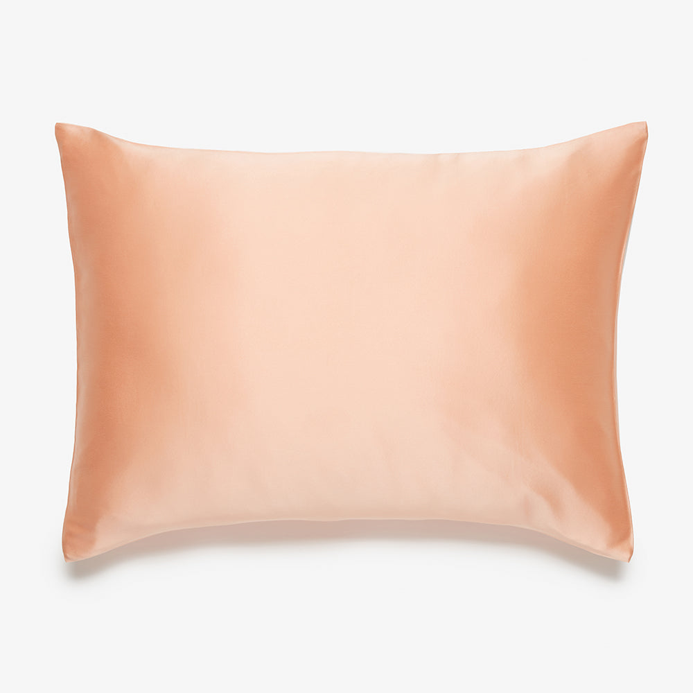 silk pillowcase in peach top view
