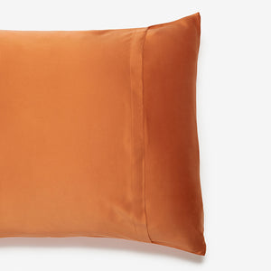 silk pillowcase in terracotta side view