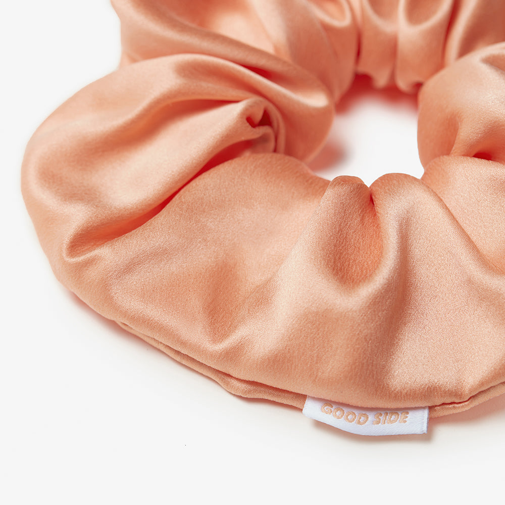 jumbo silk scrunchie in peach close up